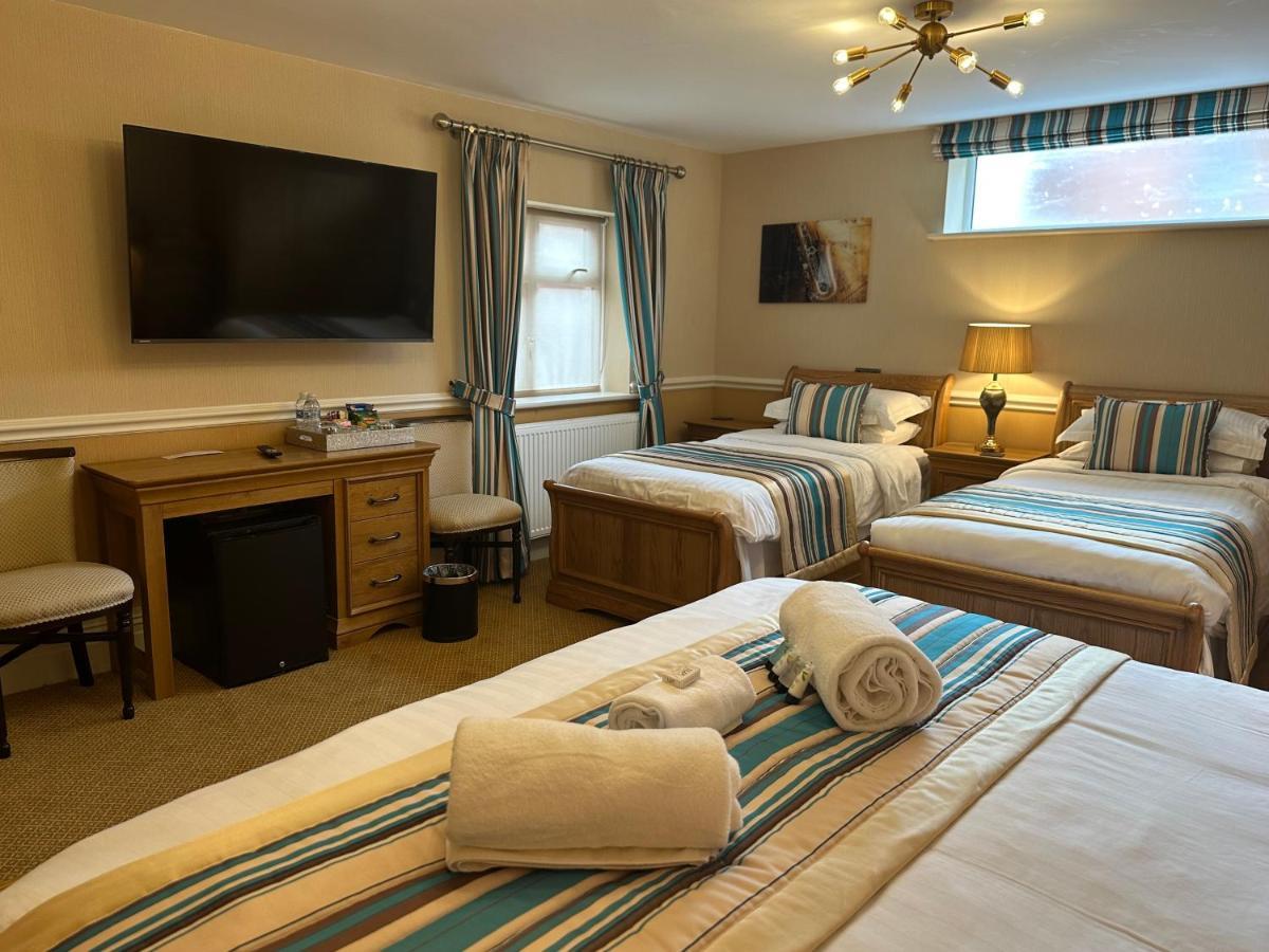 Chester House Guest House Eksteriør billede Family room at the Old Mill
